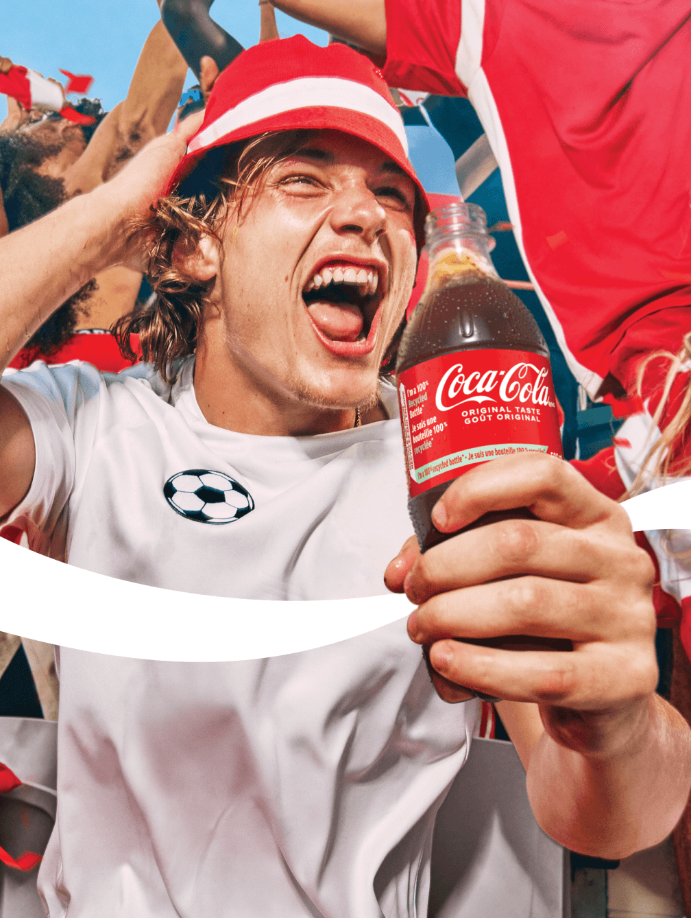 A person with a Coca-Cola® bottle